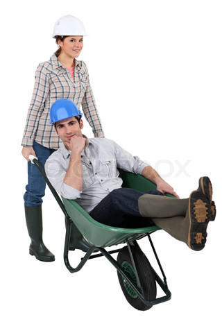 8305420-303407-craftswoman-carrying-a-craftsman-sitting-in-a-wheelbarrow