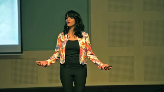 Image of RJ Malavika Varadan presenting TED talk at BITS Pilani
