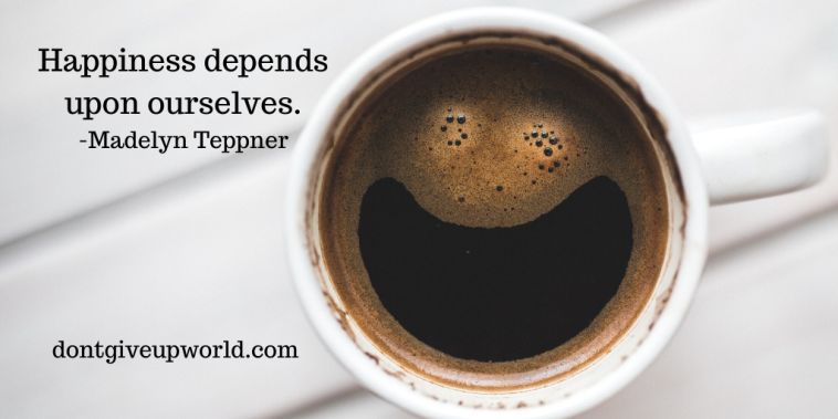 It is the image of cup and smile face is made inside it, and Quote on Happiness by Madelyn Teppner is written