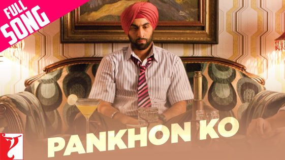 The image contains the photo of Ranbir Kapoor in red turban and sitting on the couch