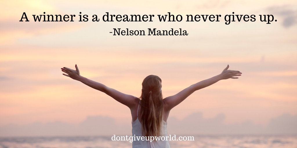 Quote by Nelson Mandela | Winner and Dreamer .
Girl with open arms on a beach under pink beach
Wallpaper with quote " A winner is a dreamer who never gives up."