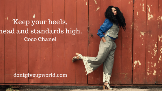 Image is of Coco Chanel standing against walls, with some motivational quotes written next to her.